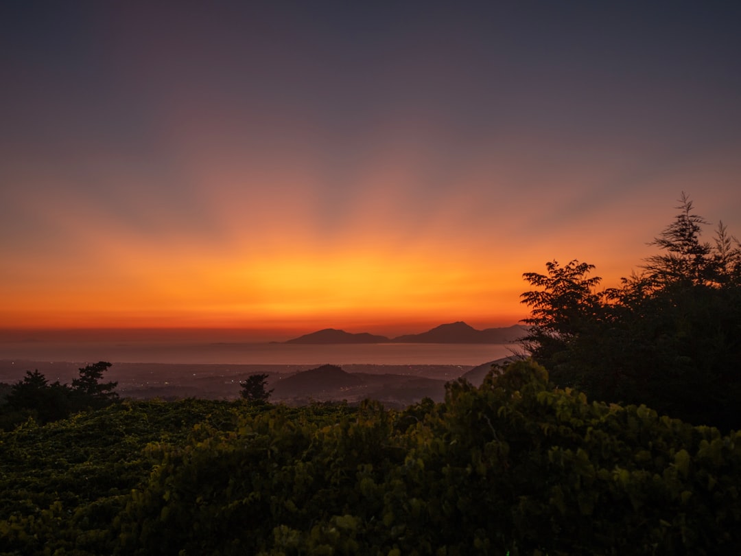 a sunset over a lake
